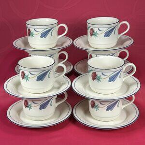 8 sets of tea cup & saucer. Lenox China Stone Poppies on blue